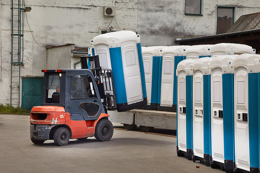utility cart carrying the portable toilet